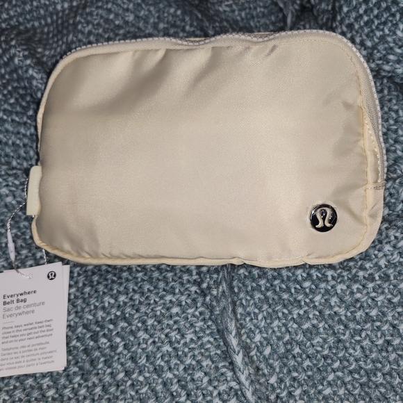 lululemon athletica Handbags - Lululemon Ivory Everywhere Belt Bag. 1L NEW w/tag.